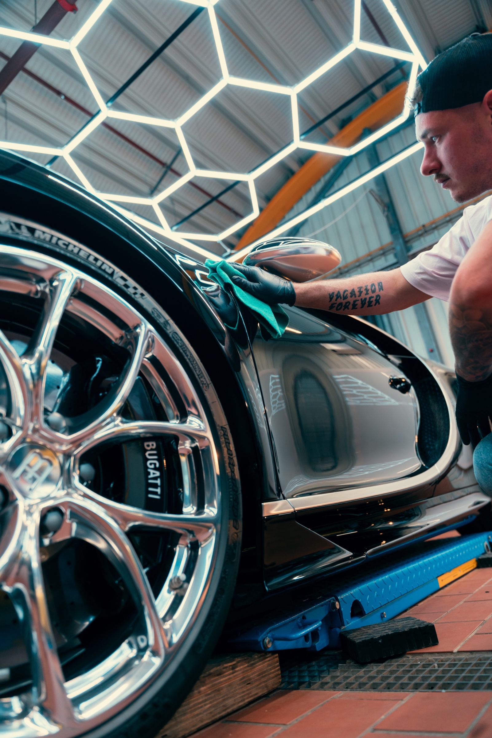 Ferrari badge detailing close-up showing C² SiO2 molecular integration with Italian acrylic clear coat
